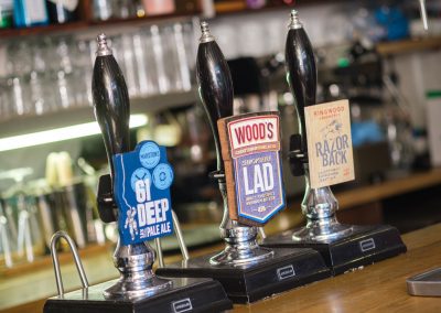 enjoy a beer in riverside pub in ironbridge